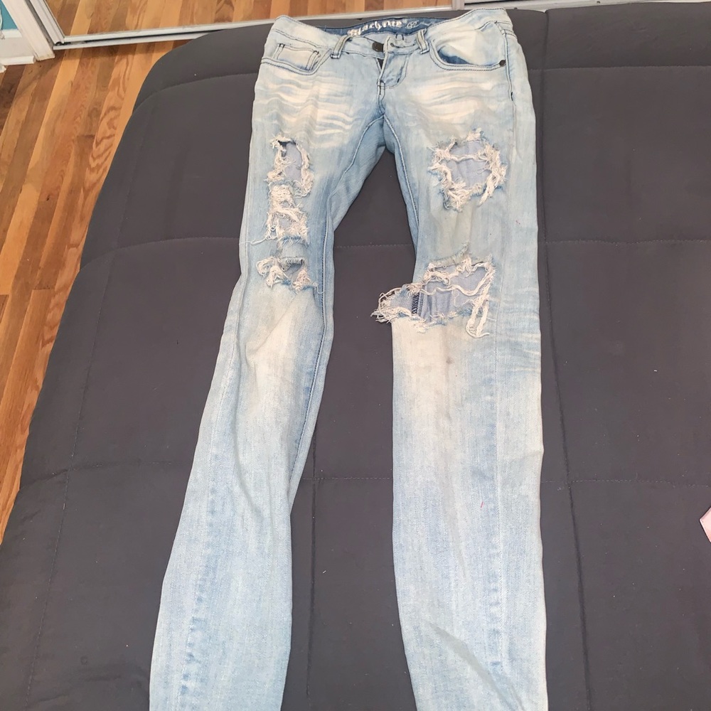 Light wash ripped skinny jeans.